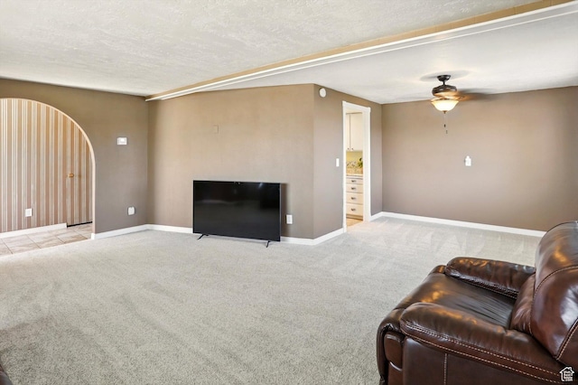 2226 W 1000 N, Tremonton, UT 84337 - living room featuring ceiling fan, carpet floors, baseboards, and a textured ceiling