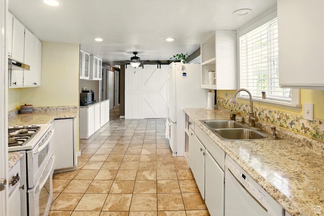 2226 W 1000 N, Tremonton, UT 84337 - kitchen featuring white appliances, a sink, under cabinet range hood, white cabinetry, and recessed lighting