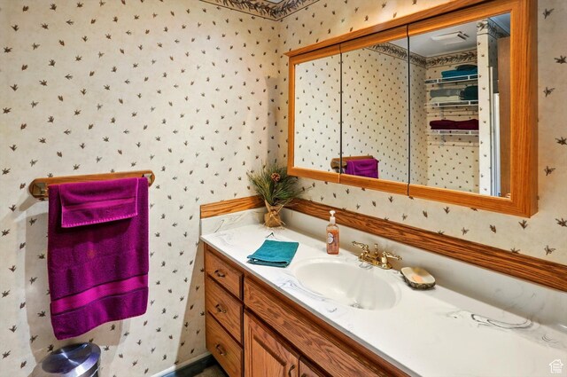2226 W 1000 N, Tremonton, UT 84337 - bathroom featuring wallpapered walls and vanity