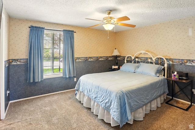 2226 W 1000 N, Tremonton, UT 84337 - bedroom featuring wallpapered walls, a textured ceiling, carpet floors, and a ceiling fan