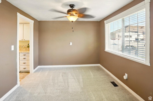 2226 W 1000 N, Tremonton, UT 84337 - empty room with ceiling fan, light carpet, and baseboards