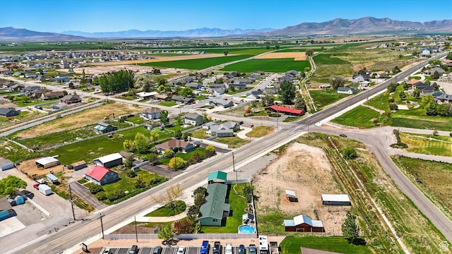2226 W 1000 N, Tremonton, UT 84337 - aerial overview of property's location featuring a mountain backdrop and nearby suburban area
