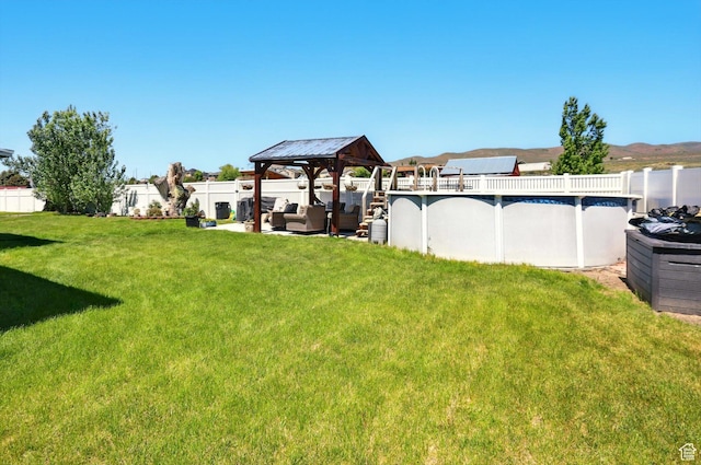 2226 W 1000 N, Tremonton, UT 84337 - view of yard featuring a gazebo and an outdoor hangout area