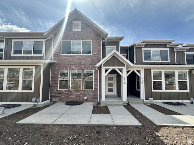 2476 N Wildwood Ln E Unit 249, Heber City, UT 84032 - view of property featuring board and batten siding and brick siding