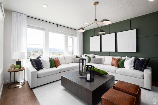 2476 N Wildwood Ln E Unit 249, Heber City, UT 84032 - living area featuring light wood-type flooring and recessed lighting