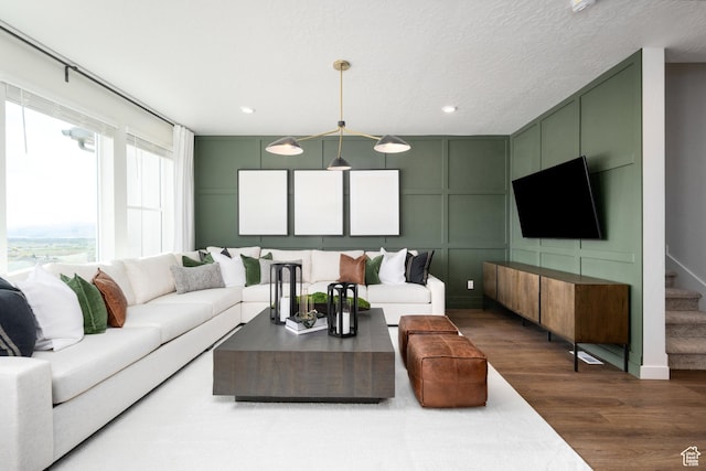 2476 N Wildwood Ln E Unit 249, Heber City, UT 84032 - living room featuring a decorative wall, dark wood-type flooring, recessed lighting, and stairs