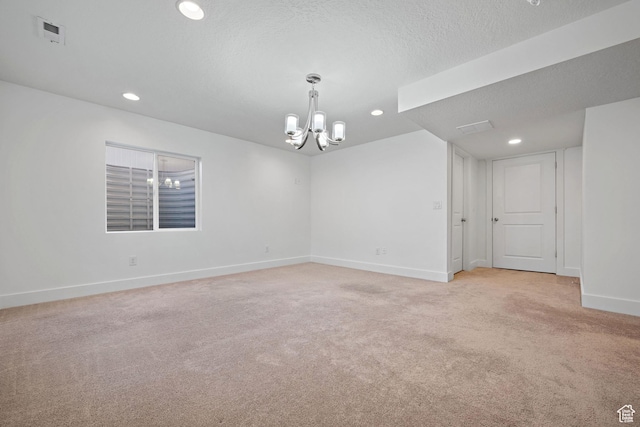 296 E 12025th St S, Draper, UT 84020 - empty room featuring a chandelier, light carpet, baseboards, recessed lighting, and a textured ceiling