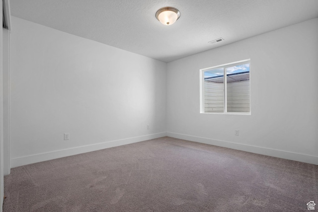 296 E 12025th St S, Draper, UT 84020 - carpeted empty room with baseboards and a textured ceiling