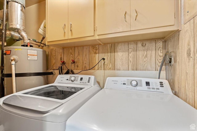 12525 S 1300 E, Draper, UT 84020 - laundry area featuring washing machine and dryer, water heater, cabinet space, and wood walls