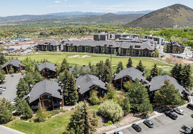 2025 Canyon Resort Dr Unit L-5, Park City, UT 84098 - drone / aerial view of a mountainous background and a golf course
