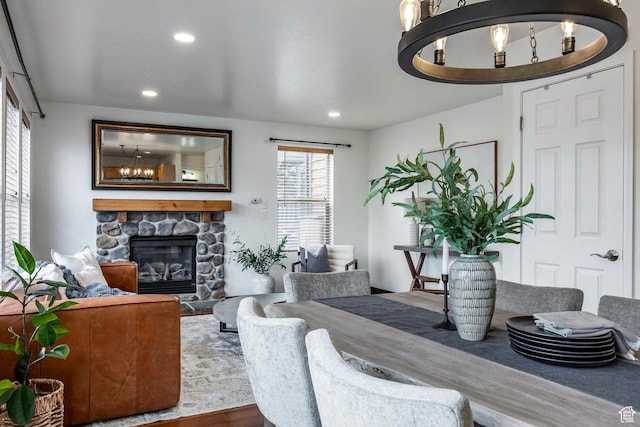 1189 E Fox Crest Dr, Park City, UT 84098 - dining area featuring a chandelier, wood finished floors, a fireplace, and recessed lighting