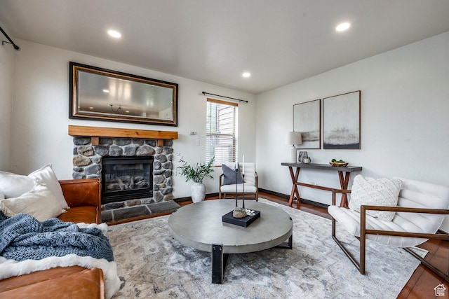 1189 E Fox Crest Dr, Park City, UT 84098 - living area featuring wood finished floors, a stone fireplace, recessed lighting, and baseboards