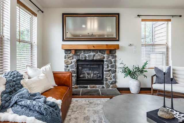 1189 E Fox Crest Dr, Park City, UT 84098 - living area with wood finished floors, a fireplace, and baseboards