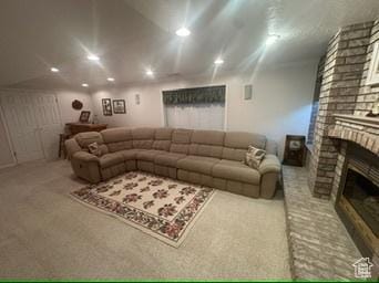 341 E Wilford Ave, Murray, UT 84107 - living area with carpet floors, a fireplace, and recessed lighting