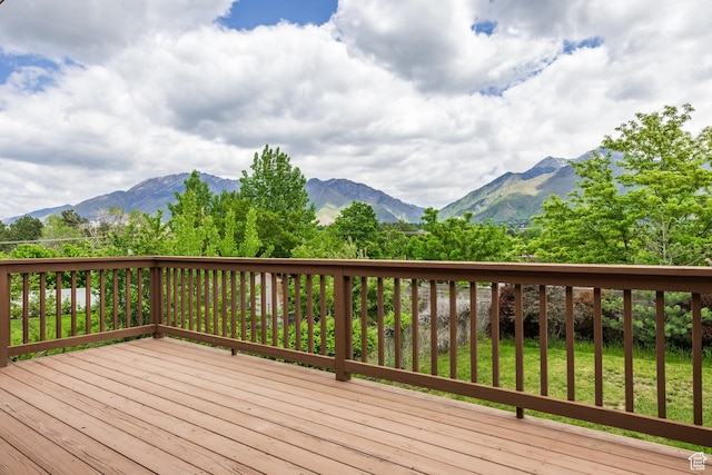 2006 E Creek Rd, Sandy, UT 84093 - wooden deck with a mountain view and a yard
