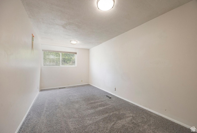 2006 E Creek Rd, Sandy, UT 84093 - carpeted empty room with a textured ceiling and baseboards