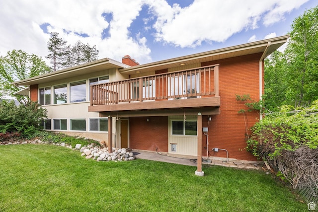 2006 E Creek Rd, Sandy, UT 84093 - rear view of house with a lawn, brick siding, and a wooden deck