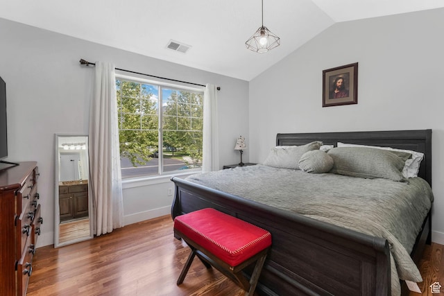 1107 N Independence Ave W, Provo, UT 84604 - bedroom featuring lofted ceiling, wood finished floors, and baseboards