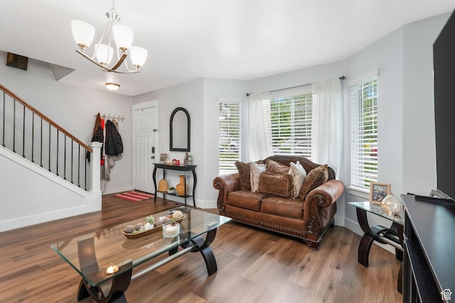 1107 N Independence Ave W, Provo, UT 84604 - living room with a chandelier, stairway, wood finished floors, and baseboards
