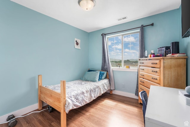 1107 N Independence Ave W, Provo, UT 84604 - bedroom featuring light wood-style flooring and baseboards