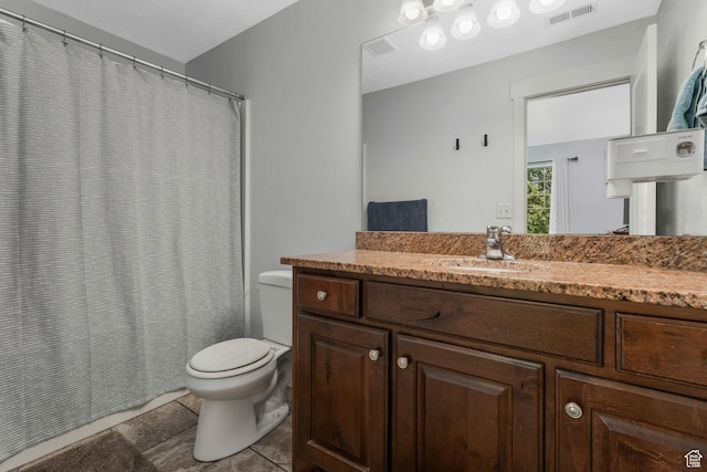 1107 N Independence Ave W, Provo, UT 84604 - full bath with toilet, tile patterned floors, vanity, and a shower with curtain