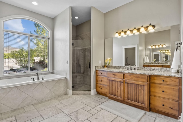 36 E 1450 N, Lehi, UT 84043 - bathroom featuring vanity, a garden tub, plenty of natural light, a stall shower, and recessed lighting
