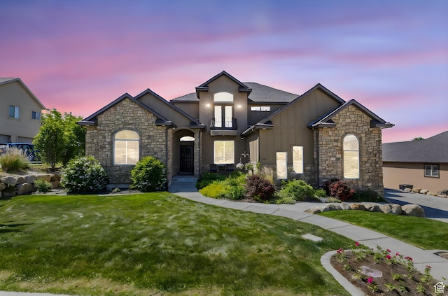 36 E 1450 N, Lehi, UT 84043 - view of front facade with board and batten siding, stone siding, and a lawn