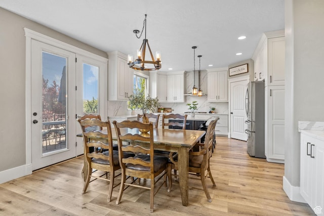 36 E 1450 N, Lehi, UT 84043 - dining space featuring a chandelier, light wood-style flooring, recessed lighting, and baseboards