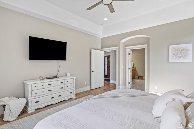36 E 1450 N, Lehi, UT 84043 - bedroom with light wood-type flooring, baseboards, a ceiling fan, and arched walkways