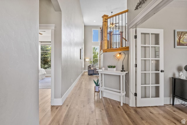 36 E 1450 N, Lehi, UT 84043 - hall with arched walkways, wood finished floors, healthy amount of natural light, and baseboards