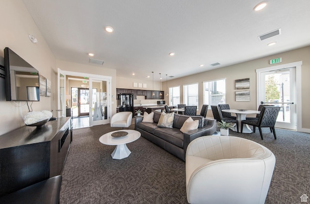 5288 W Solafax Ln Unit 34-1, Herriman, UT 84096 - living area featuring carpet floors and recessed lighting