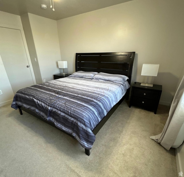 5288 W Solafax Ln Unit 34-1, Herriman, UT 84096 - bedroom with carpet and baseboards
