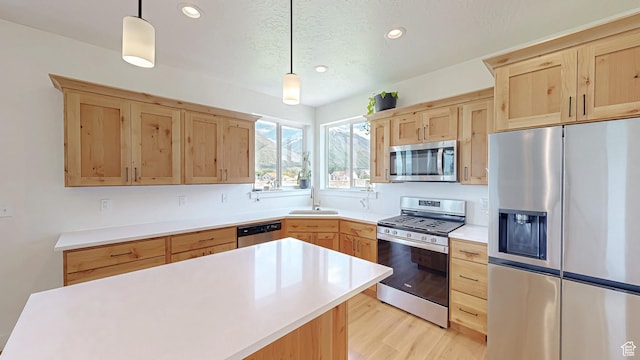 492 N 910 E, Salem, UT 84653 - kitchen with appliances with stainless steel finishes, light brown cabinetry, a sink, light countertops, and recessed lighting