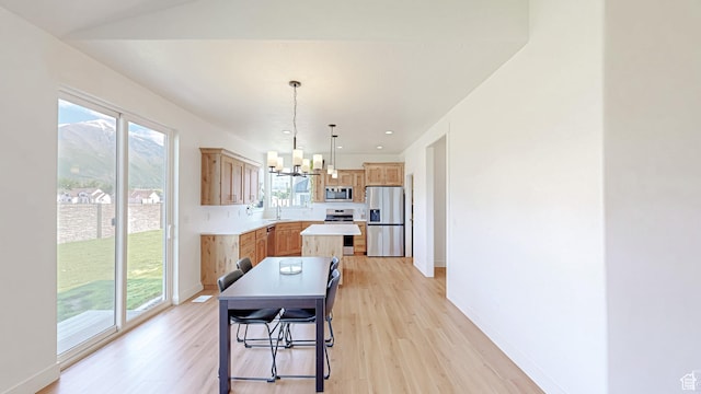 492 N 910 E, Salem, UT 84653 - dining room with a chandelier, plenty of natural light, and light wood-style flooring