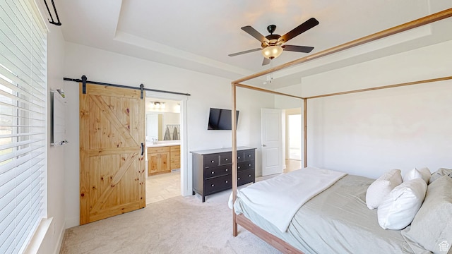 492 N 910 E, Salem, UT 84653 - bedroom featuring a barn door, light colored carpet, ensuite bath, and a ceiling fan