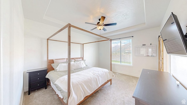 492 N 910 E, Salem, UT 84653 - bedroom featuring a tray ceiling, light colored carpet, baseboards, and a ceiling fan