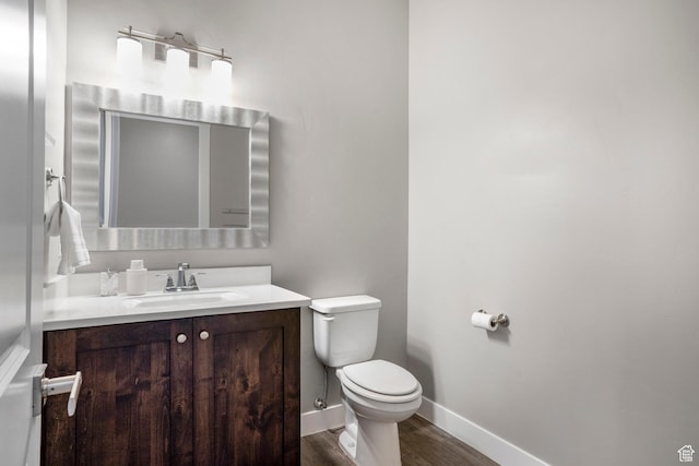 3691 W 2800 S, Hurricane, UT 84737 - half bath with toilet, vanity, wood finished floors, and baseboards