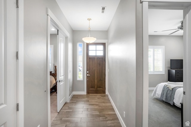 3691 W 2800 S, Hurricane, UT 84737 - entryway with light wood finished floors, baseboards, and ceiling fan