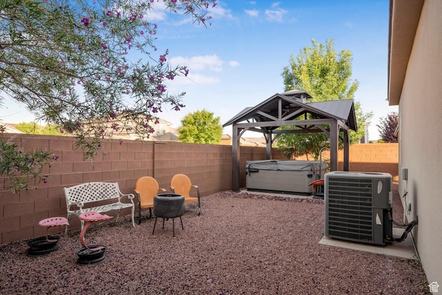 3691 W 2800 S, Hurricane, UT 84737 - fenced backyard with central AC unit, a hot tub, and a gazebo