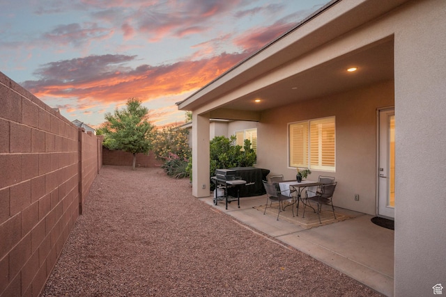 3691 W 2800 S, Hurricane, UT 84737 - patio terrace at dusk with a fenced backyard and a patio area