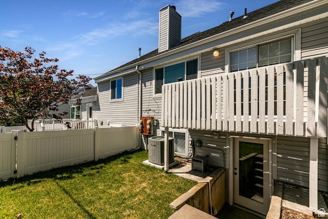 545 W Applewood Dr S # 10, Bountiful, UT 84010 - back of house with a chimney and central air condition unit
