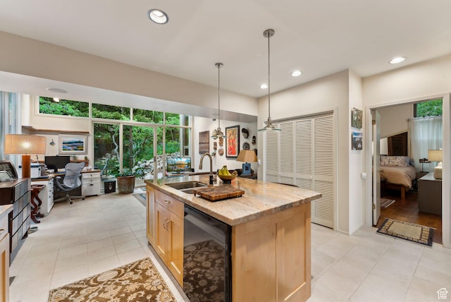 4517 S Abinadi Rd, Millcreek, UT 84124 - kitchen featuring beverage cooler, a desk, a sink, light tile patterned flooring, and recessed lighting