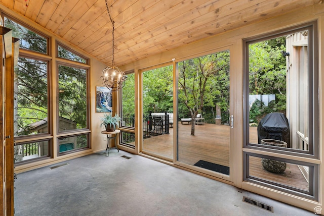4517 S Abinadi Rd, Millcreek, UT 84124 - unfurnished sunroom with plenty of natural light, a chandelier, vaulted ceiling, wood ceiling, and carpet flooring