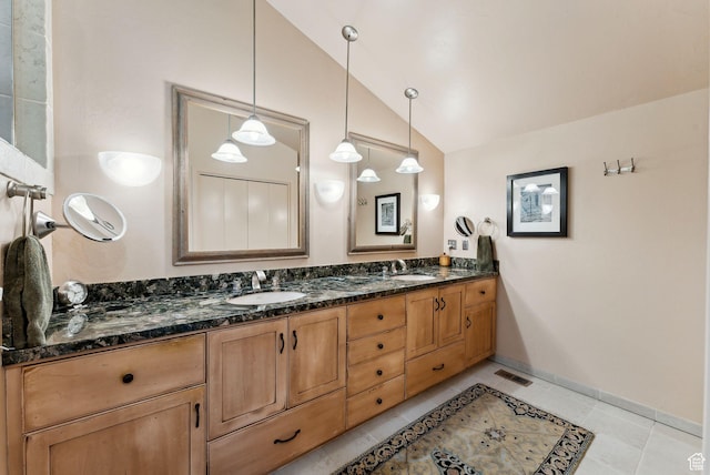 4517 S Abinadi Rd, Millcreek, UT 84124 - full bathroom featuring double vanity, lofted ceiling, tile patterned floors, and baseboards