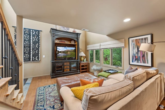 4517 S Abinadi Rd, Millcreek, UT 84124 - living room featuring stairway, wood finished floors, recessed lighting, and baseboards
