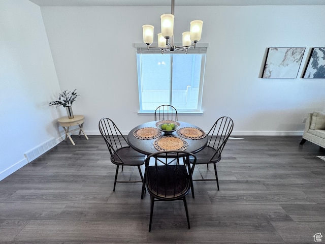 12754 S Quail Lake Dr Unit 126, Riverton, UT 84096 - dining area with a chandelier, dark wood-type flooring, and baseboards
