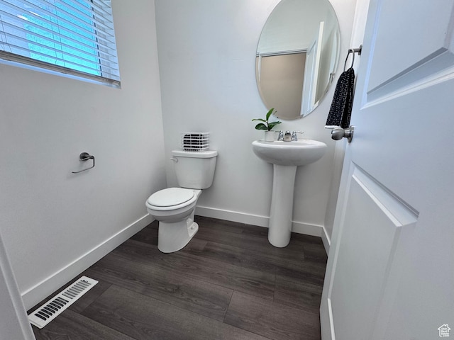 12754 S Quail Lake Dr Unit 126, Riverton, UT 84096 - half bath with toilet, baseboards, wood finished floors, and a sink