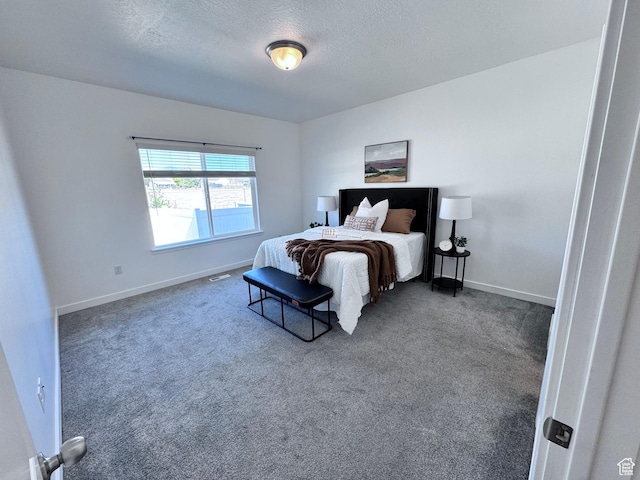 12754 S Quail Lake Dr Unit 126, Riverton, UT 84096 - carpeted bedroom with a textured ceiling and baseboards