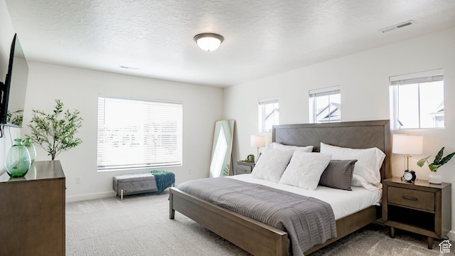 4357 E Longleaf Ln, Eagle Mountain, UT 84005 - bedroom featuring light colored carpet, baseboards, and a textured ceiling