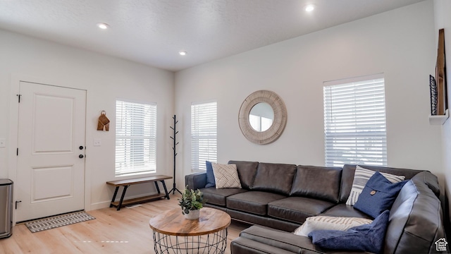 4357 E Longleaf Ln, Eagle Mountain, UT 84005 - living area featuring light wood-type flooring, recessed lighting, and baseboards